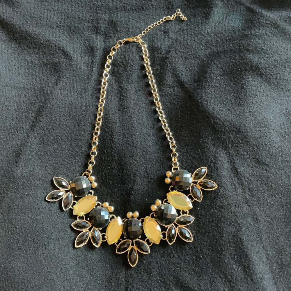 Gold and black necklace